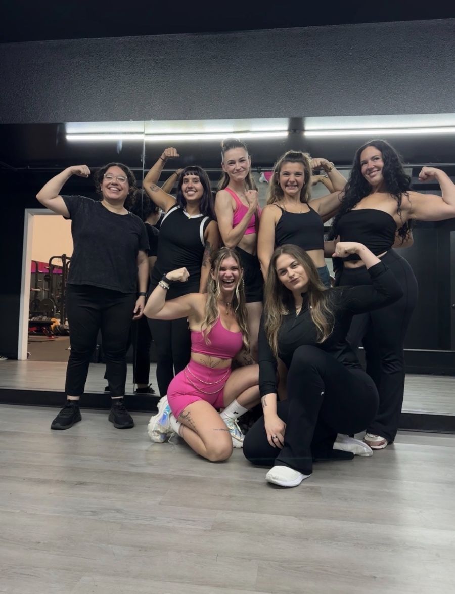The retreat group flexing together in the studio