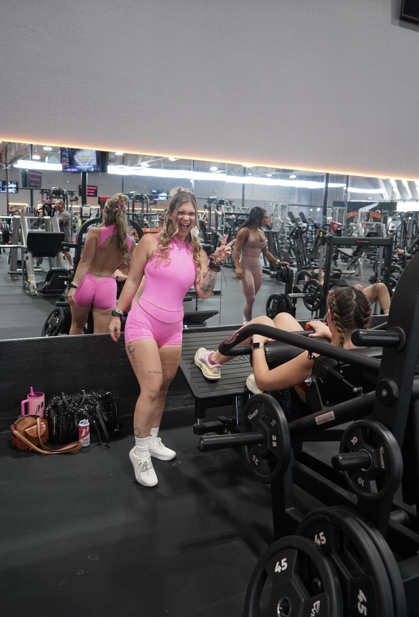 Sami throwing a peace sign during the gym tour