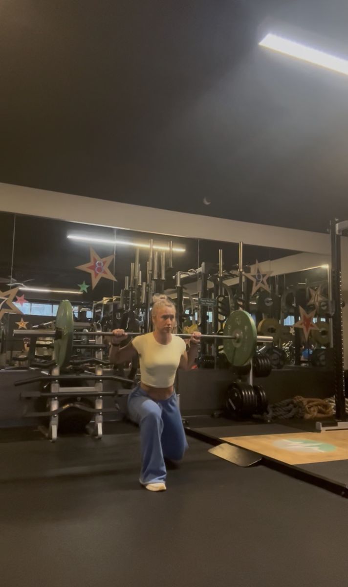 Kat doing a barbell split squat